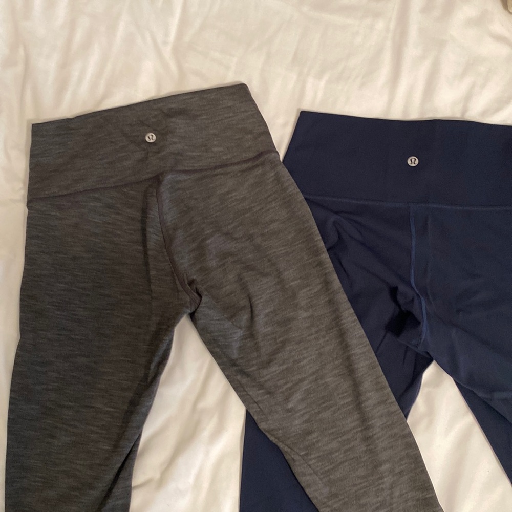 Lululemon tights. Two pair. One gray and one navy. Excellent condition